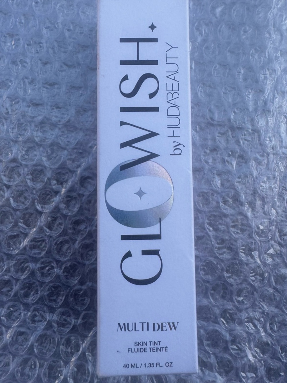 HUDA BEAUTY Glowish Multi Dew Skin Tint - Beige/White